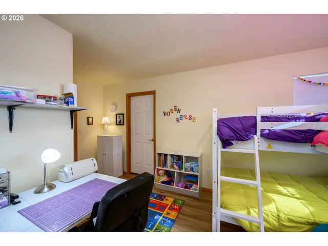 a bedroom with a bed and a closet