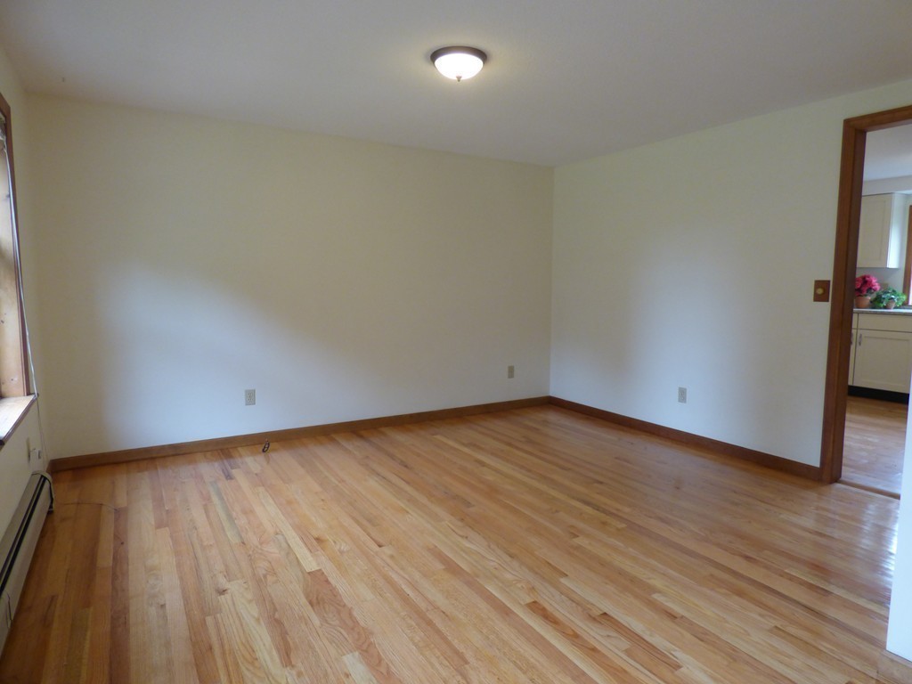 560 Station Road Amherst, MA 01002 - Photo 12 of 30 a view of an empty room and wooden floor