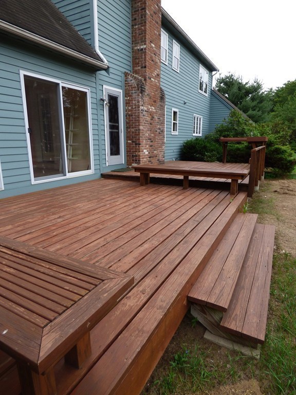 560 Station Road Amherst, MA 01002 - Photo 15 of 30 a view of backyard with deck