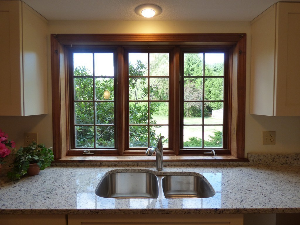 560 Station Road Amherst, MA 01002 - Photo 5 of 30 a view of a kitchen that has a sink and a window