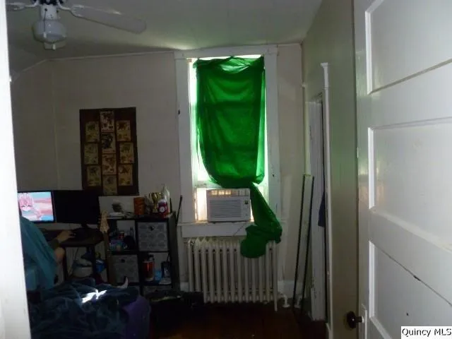 a bathroom with a sink vanity and a mirror