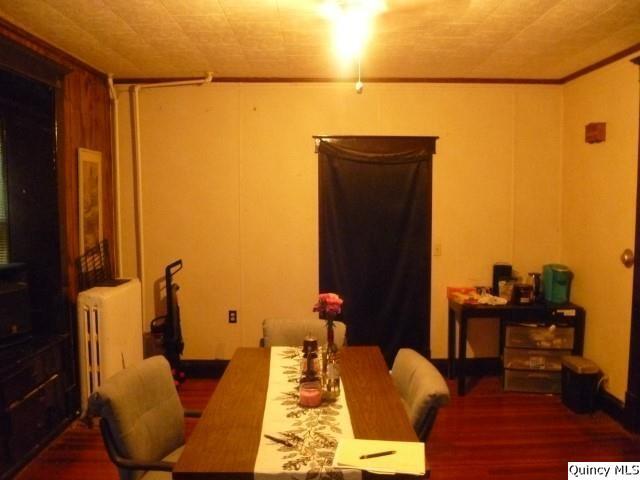 233 North 1st Street Carthage, IL 62321 - Photo 6 of 30 a balcony with furniture and wooden floor