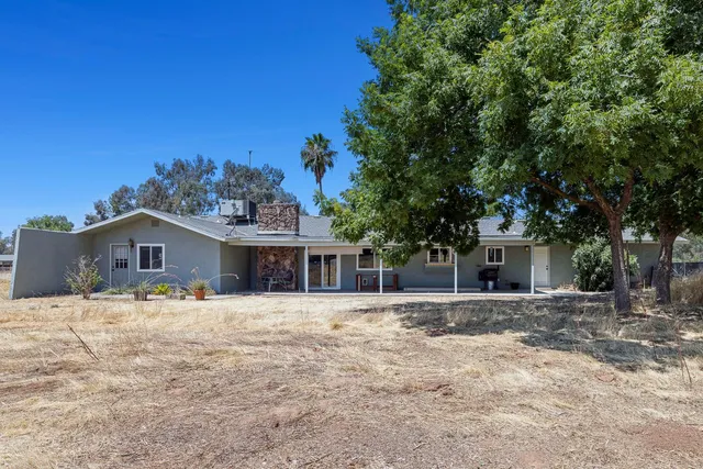 a vase of flowers sitting on a table