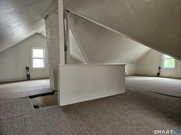 a view of hallway with livingroom