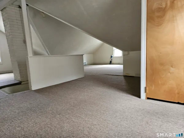 a view of a big room with closet and cabinet