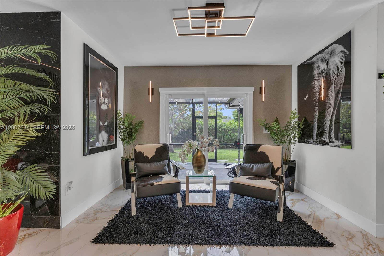 13540 Southwest 98th Court Miami, FL 33176 - Photo 19 of 43 a living room with furniture and a large window