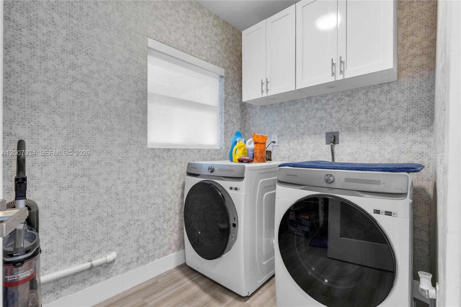 13540 Southwest 98th Court Miami, FL 33176 - Photo 22 of 43 a utility room with dryer and washer