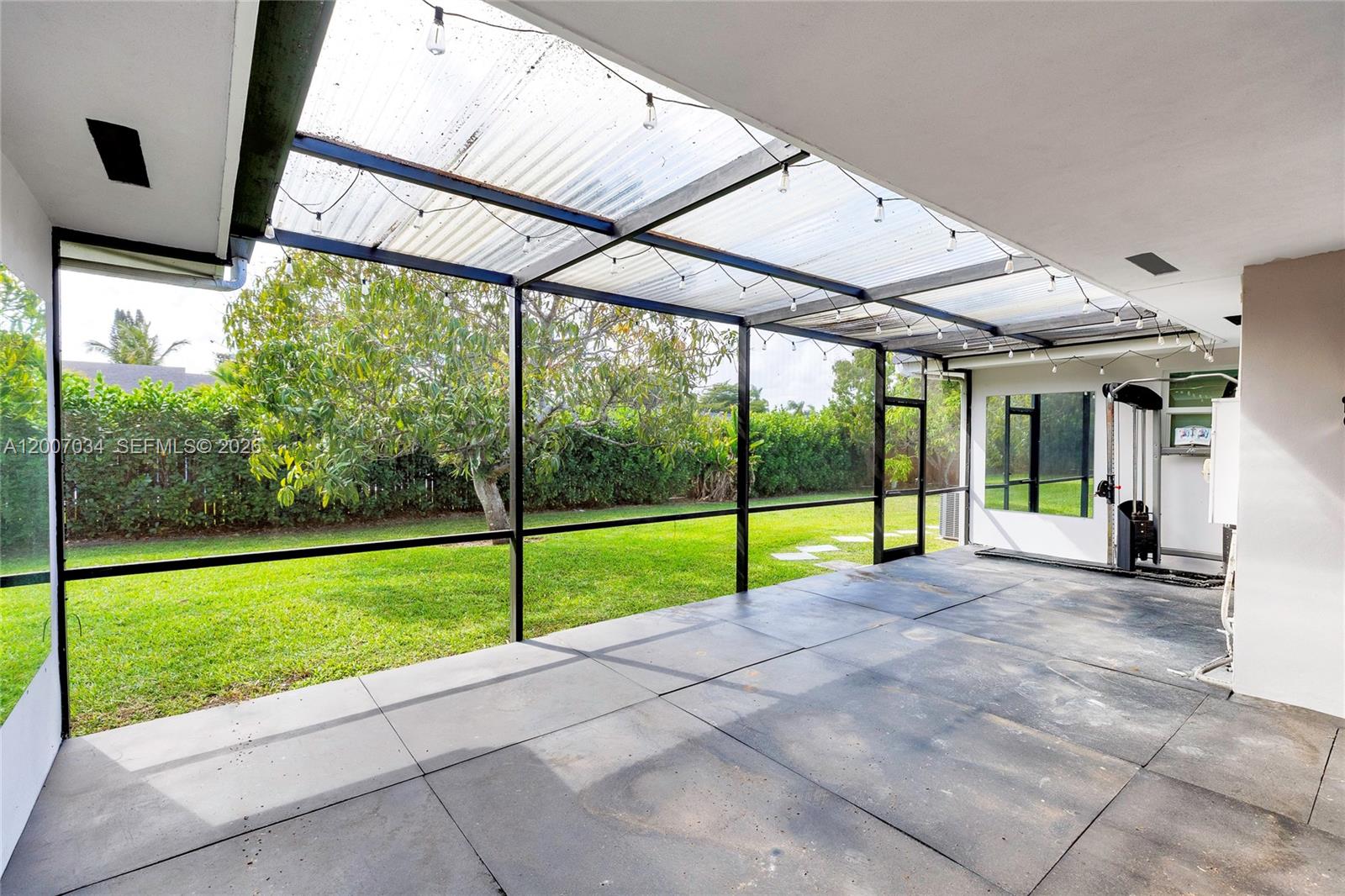 13540 Southwest 98th Court Miami, FL 33176 - Photo 33 of 43 a view of a house with backyard and porch