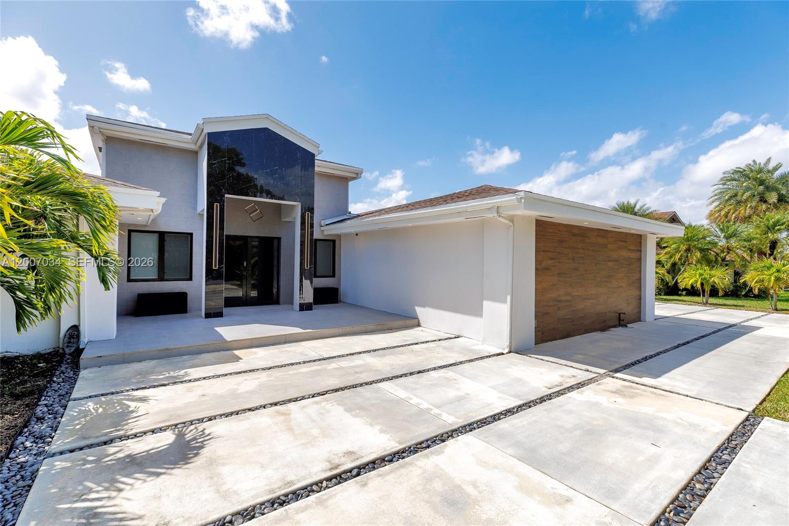 13540 Southwest 98th Court Miami, FL 33176 - Photo 35 of 43 a house view with a outdoor space
