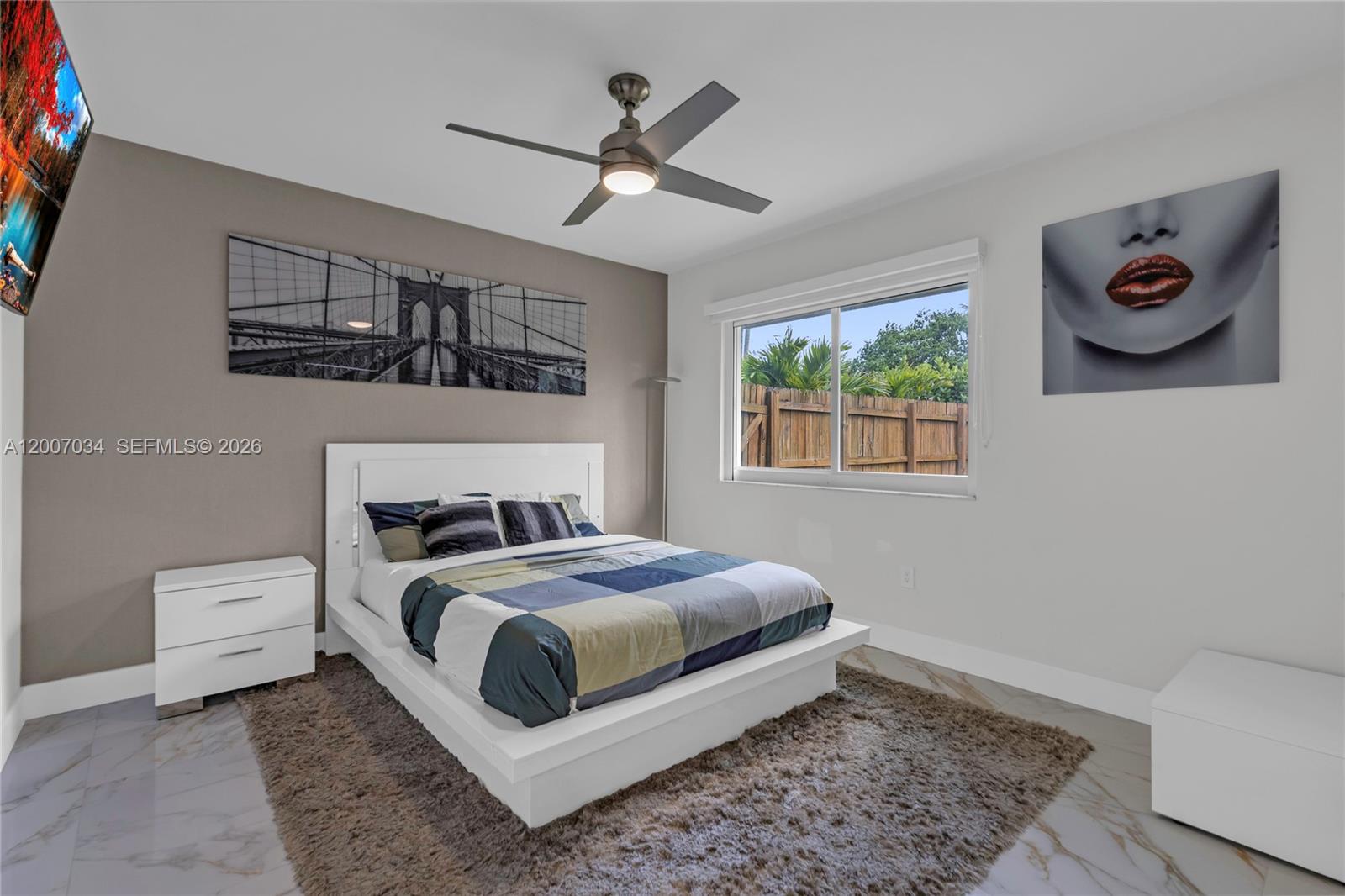 13540 Southwest 98th Court Miami, FL 33176 - Photo 5 of 43 a bedroom with a bed and a window