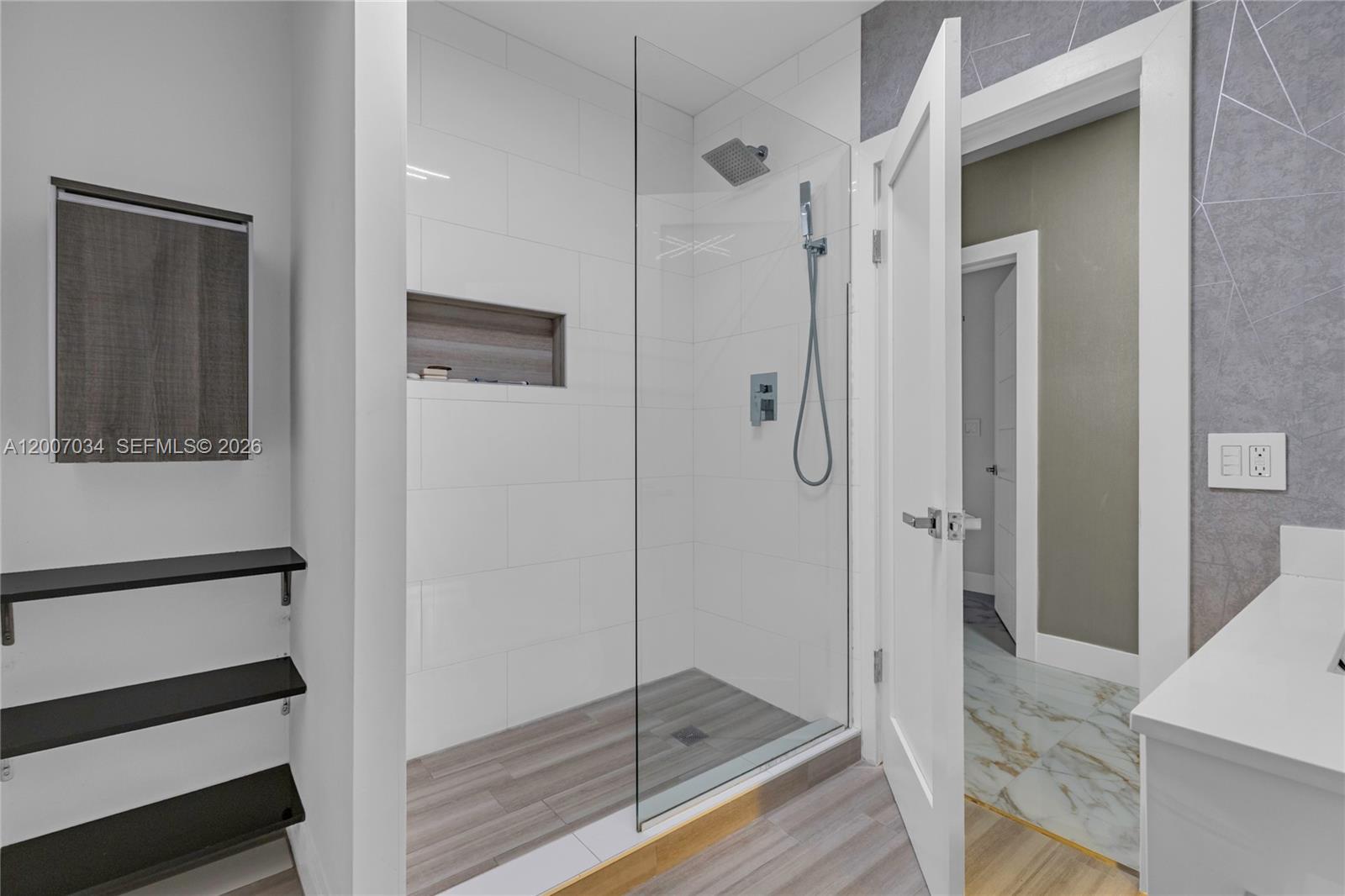 13540 Southwest 98th Court Miami, FL 33176 - Photo 7 of 43 a bathroom with a shower and a mirror