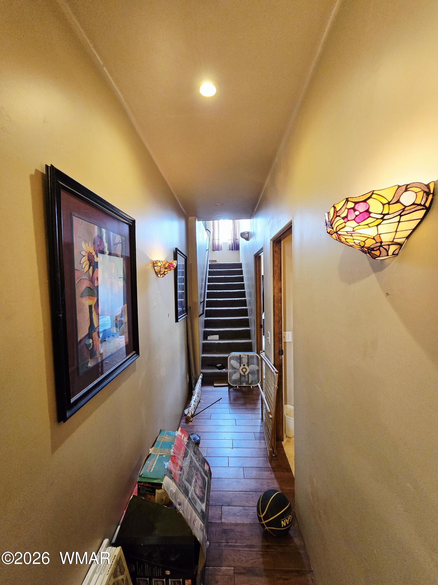 9046 Miller Trail Snowflake, AZ 85937 - Photo 18 of 34 a view of room with stairs and a couch