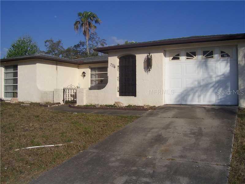 7734 Sagebrush Drive Port Richey, FL 34668 - Photo 1 of 1 Exterior Front