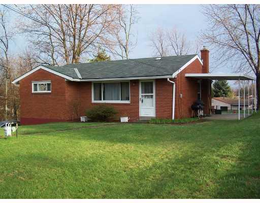 305 Ewings Mill Road Coraopolis, PA 15108 - Photo 1 of 8 Exterior Front. Cozy Brick Ranch Nestled On A Beautiful Corner Lot.