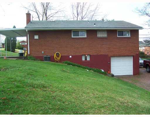 305 Ewings Mill Road Coraopolis, PA 15108 - Photo 6 of 8 Exterior Back. Great Covered Patio. Truly A Park Like Setting.