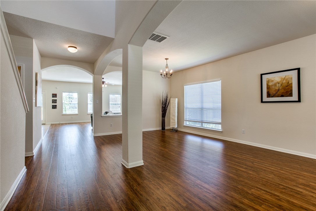 4015 Meadow Bluff Way Round Rock, TX 78665 - Photo 1 of 1 a view of an entryway with wooden floors