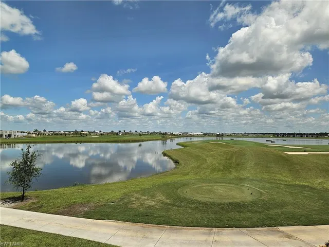 a view of a lake from a yard