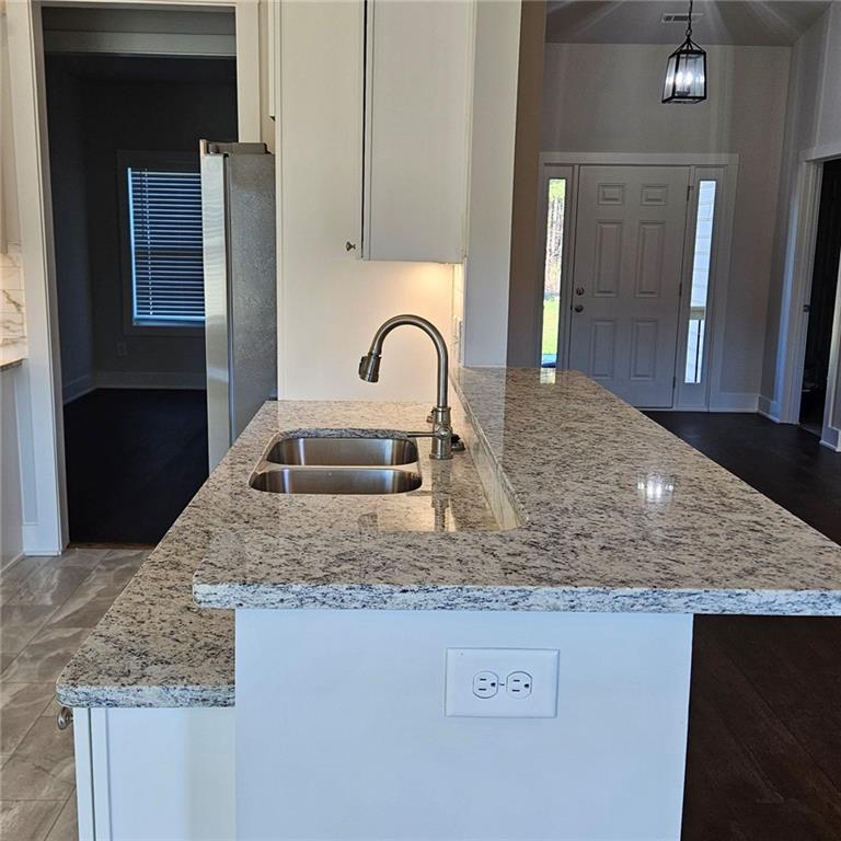 201 Damascus Road Homer, GA 30547 - Photo 12 of 37 a kitchen with granite countertop a sink and a granite counter top