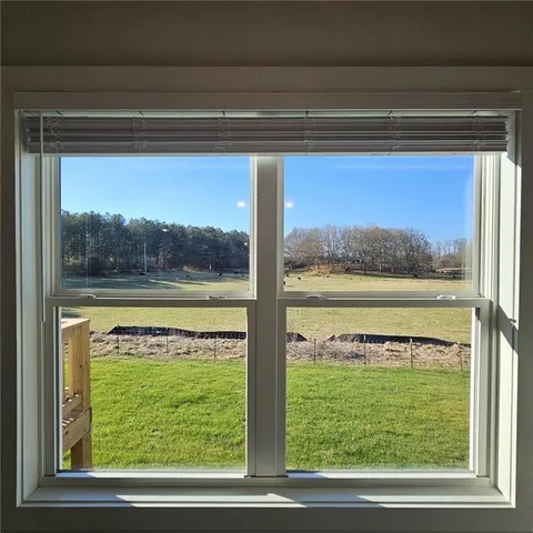 a view of a room that has a bed
