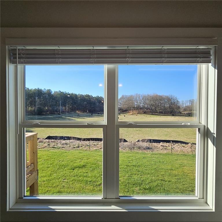 201 Damascus Road Homer, GA 30547 - Photo 16 of 37 a view of a room that has a bed