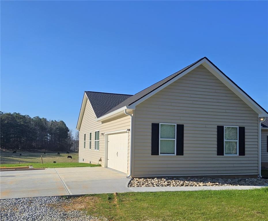 201 Damascus Road Homer, GA 30547 - Photo 2 of 37 a front view of a house with a yard