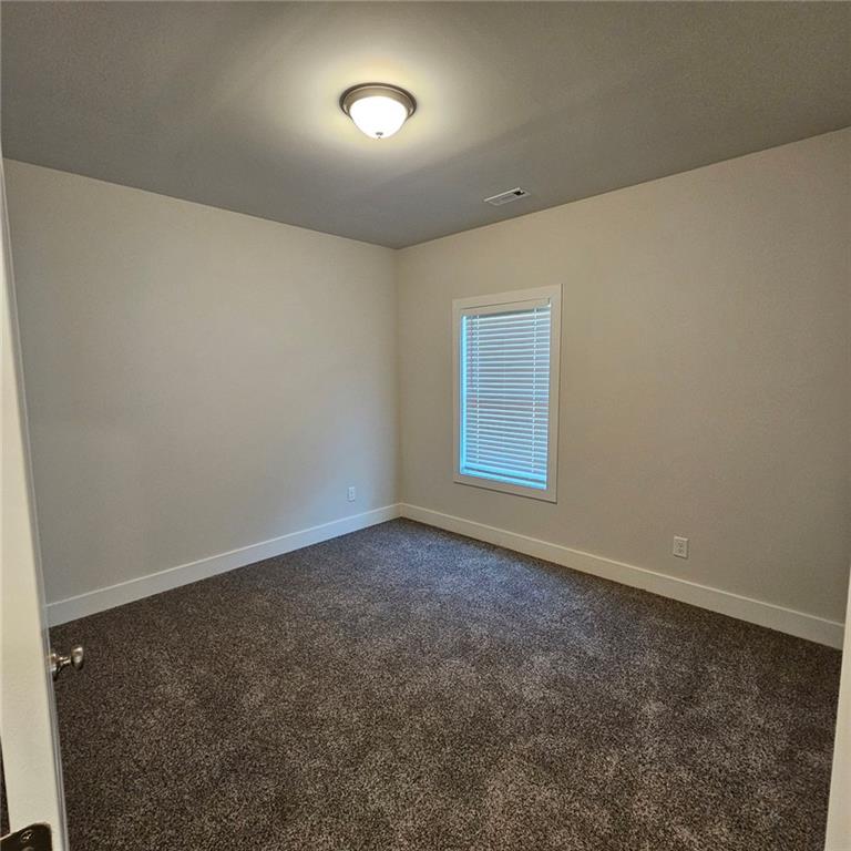 201 Damascus Road Homer, GA 30547 - Photo 29 of 37 an empty room with windows