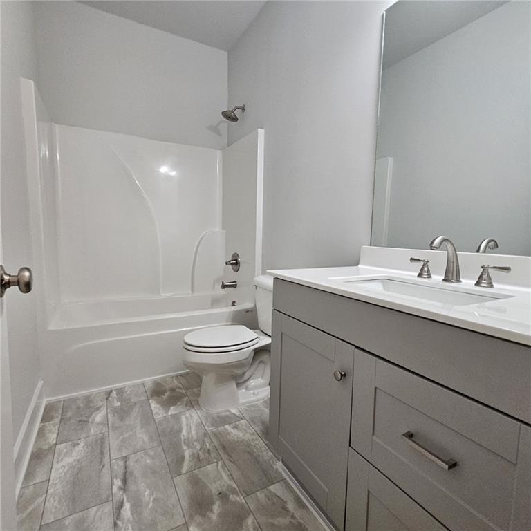 201 Damascus Road Homer, GA 30547 - Photo 30 of 37 a bathroom with a sink a toilet and shower