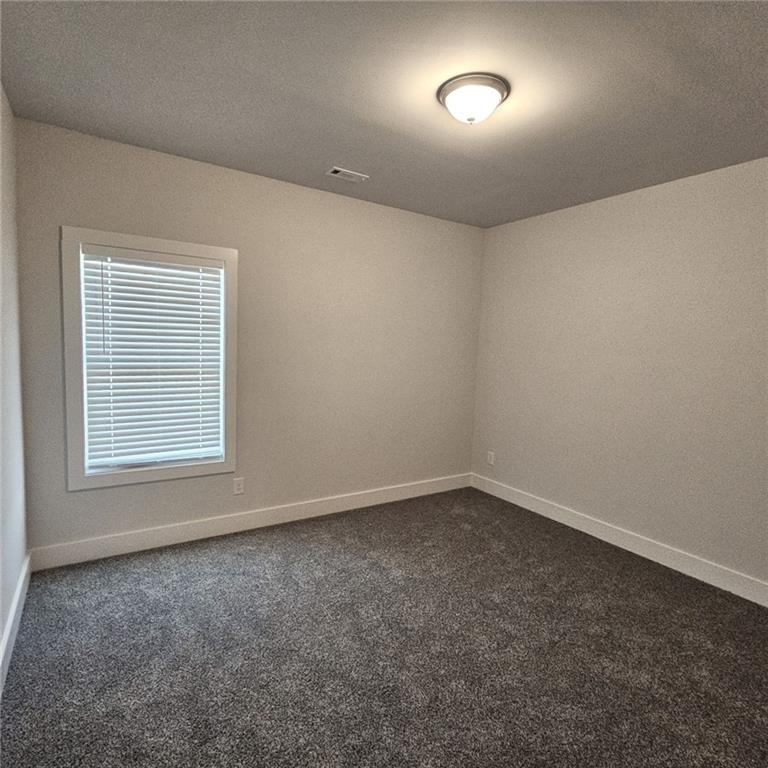 201 Damascus Road Homer, GA 30547 - Photo 31 of 37 an empty room with a window