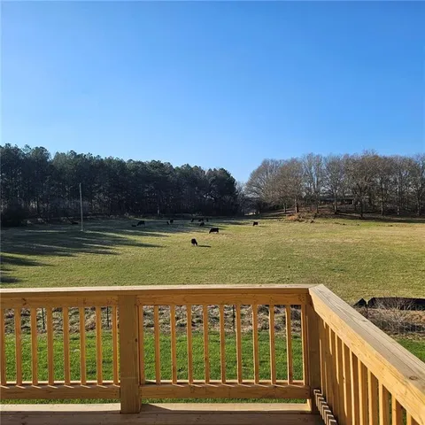 a view of a swimming pool with an ocean view