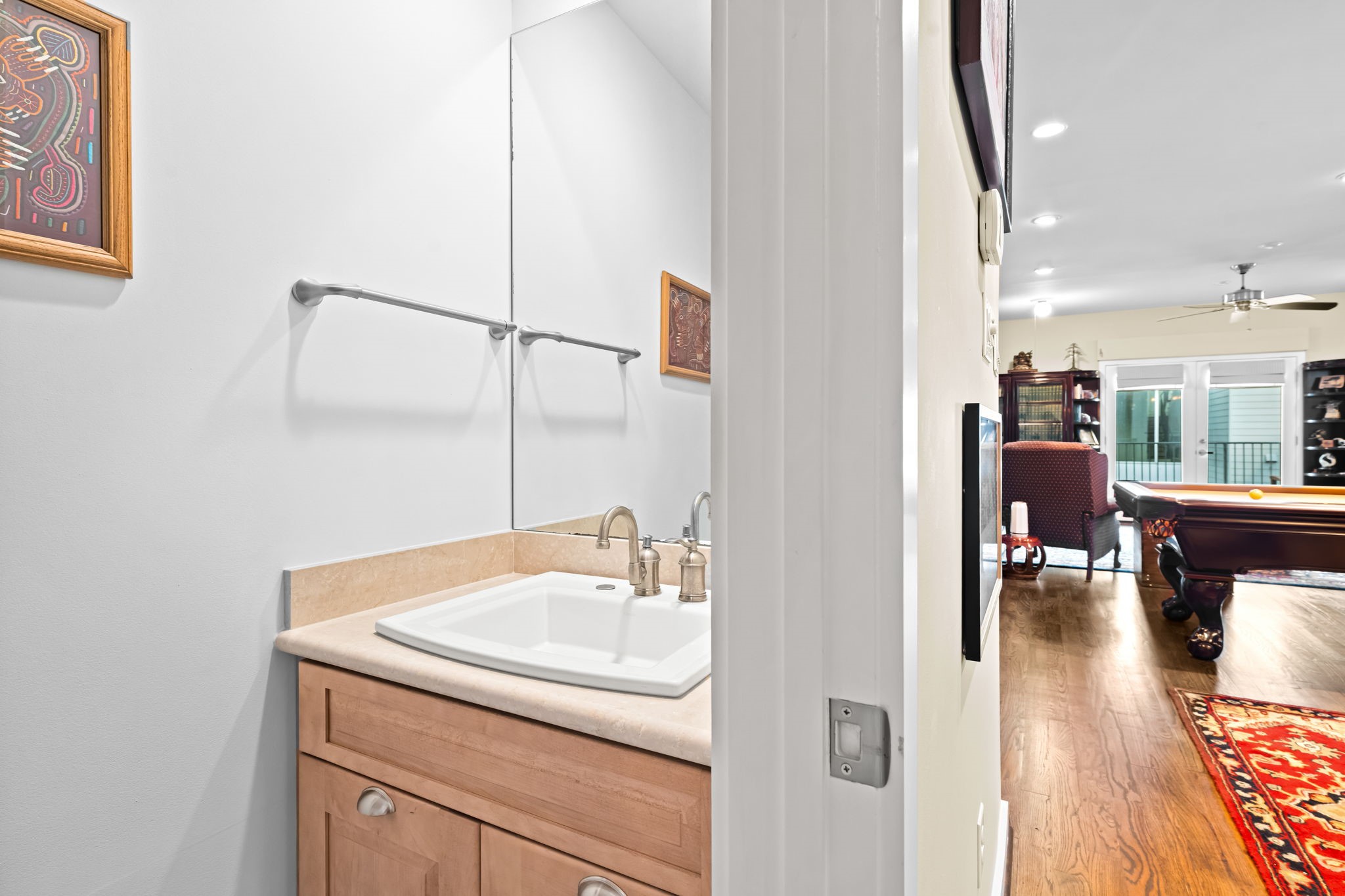 1820 Palm Street Houston, TX 77004 - Photo 12 of 47 a en suite bathroom with a sink and mirror