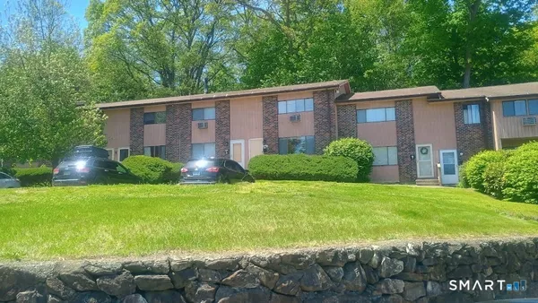 a view of a back yard of the house
