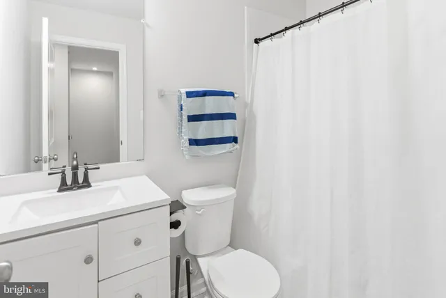 a bedroom with a bed and a closet