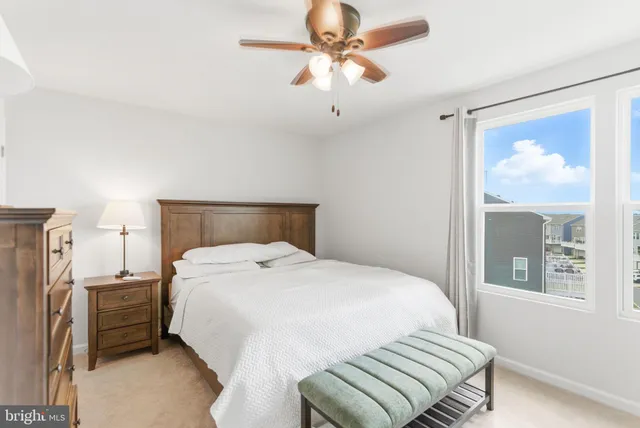 a bathroom with a sink toilet and mirror
