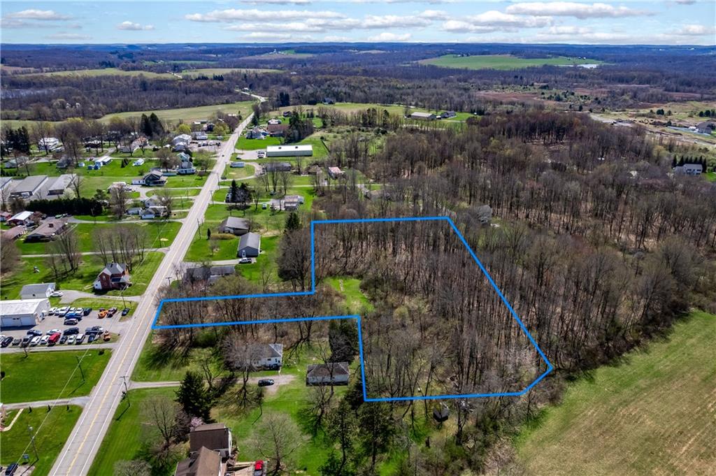 573 East Main St Extension Grove City, PA 16127 - Photo 3 of 7 a view of a yard with an outdoor space