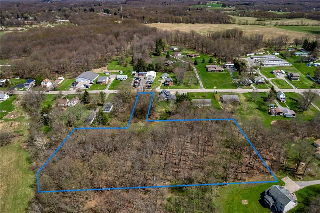 573 East Main St Extension Grove City, PA 16127 - Photo 5 of 7 a view of a lake with large trees