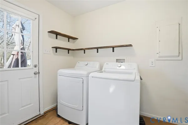 a utility room with dryer and washer