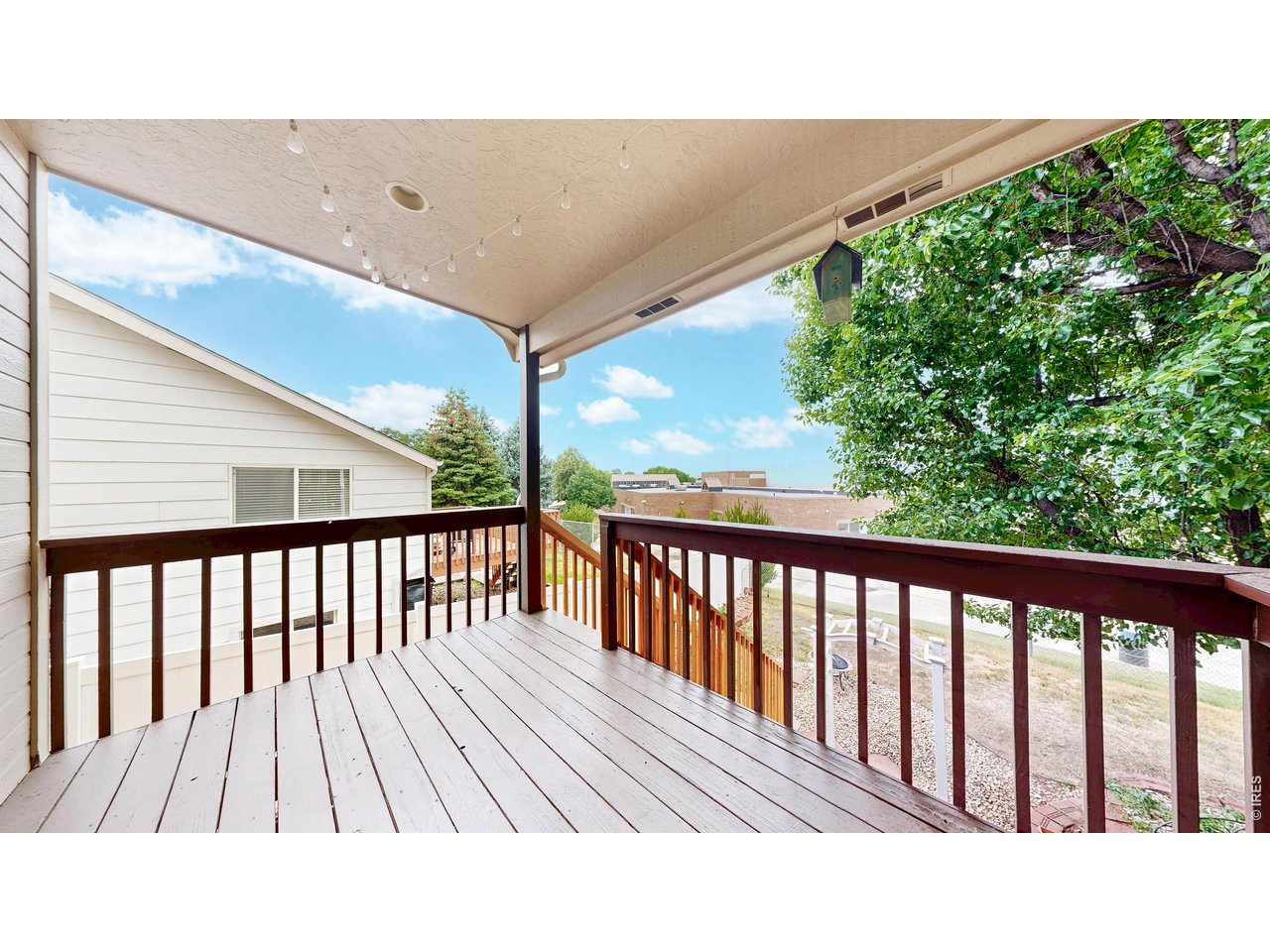 5017 West 6th Street Road Greeley, CO 80634 - Photo 15 of 42 Covered deck off of kitchen