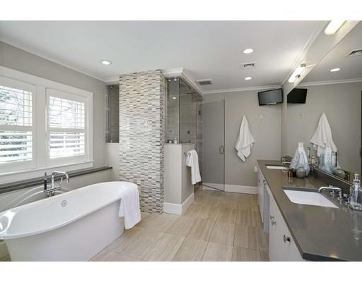 20 Gammons Road Newton, MA 02468 - Photo 20 of 28 a bathroom with a sink mirror and a bathtub