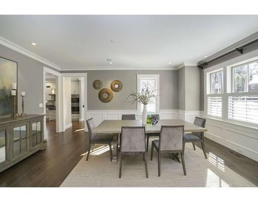 20 Gammons Road Newton, MA 02468 - Photo 9 of 28 a dining room with wooden floor and a window