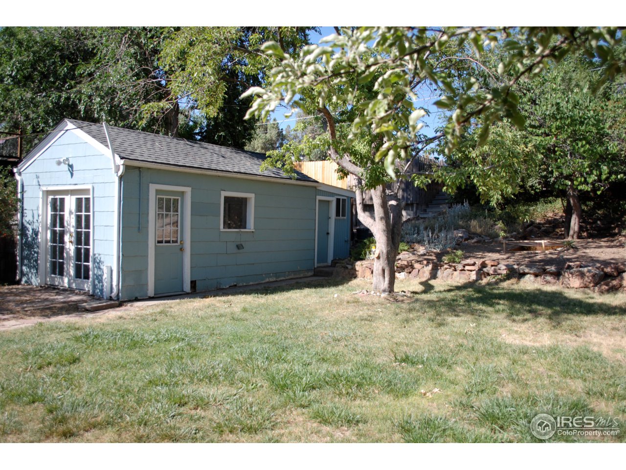2447 20th Street Boulder, CO 80304 - Photo 2 of 12 a house view with a garden space