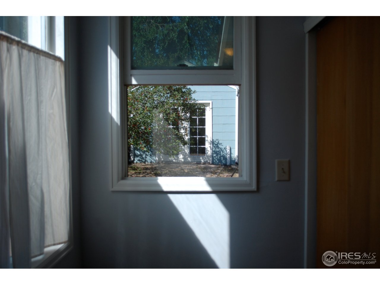 2447 20th Street Boulder, CO 80304 - Photo 7 of 12 a view of entryway with wooden floor