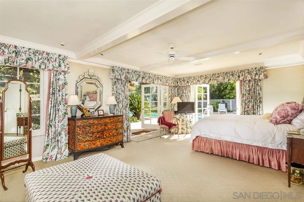 8317 La Jolla Shores Drive La Jolla, CA 92037 - Photo 15 of 25 a bed room with a bed and a couch