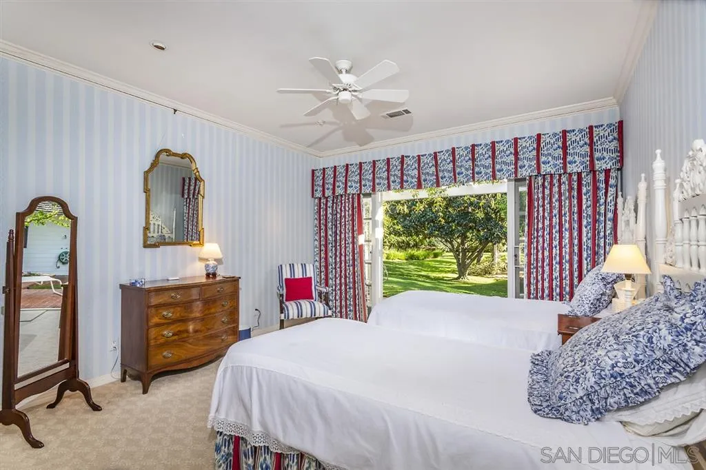 8317 La Jolla Shores Drive La Jolla, CA 92037 - Photo 17 of 25 a bed room with a bed a window and dresser