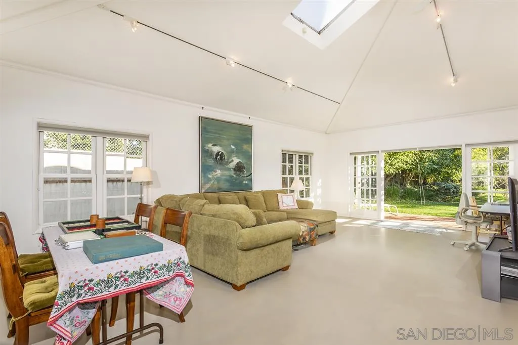 8317 La Jolla Shores Drive La Jolla, CA 92037 - Photo 25 of 25 a living room with furniture and a large window