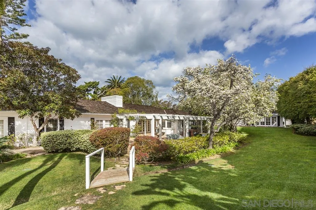8317 La Jolla Shores Drive La Jolla, CA 92037 - Photo 9 of 25 a view of a house with a yard