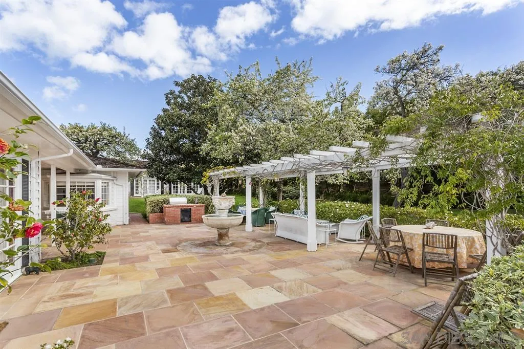 8317 La Jolla Shores Drive La Jolla, CA 92037 - Photo 10 of 25 a view of a patio with table and chairs and potted plants