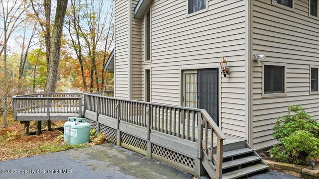 a view of a porch with a bench