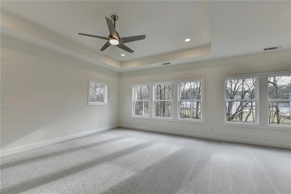 2470 Stewart Road Cumming, GA 30041 - Photo 42 of 61 a view of an empty room with a window