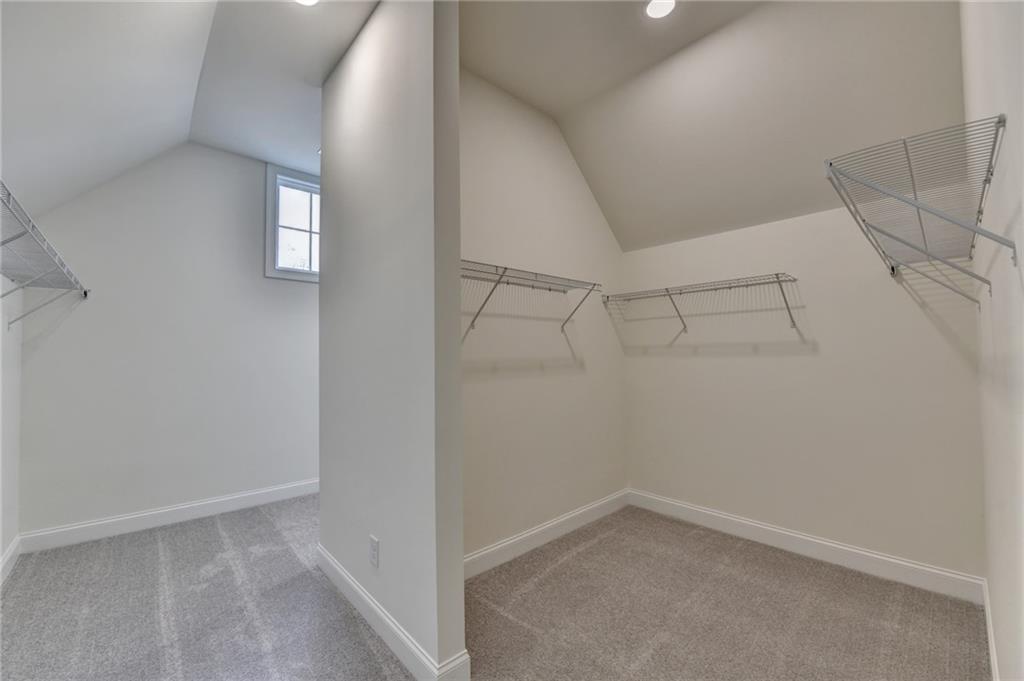 2470 Stewart Road Cumming, GA 30041 - Photo 50 of 61 a view of a room with racks on the wall