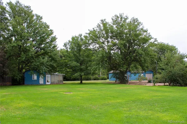 an aerial view of a house with swimming pool